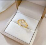 Gold Ring with Heart-shaped Design and Diamond-studded Loops for Women - Modern Jewelry for Gifting and Everyday Wear
