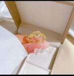 Gold Ring with Heart-shaped Design and Diamond-studded Loops for Women - Modern Jewelry for Gifting and Everyday Wear - Image 2