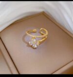 Gold Flower Ring with Cubic Zirconia Stones, Floral Design for Women, and Modern Jewelry for Everyday and Formal Occasions - Image 2