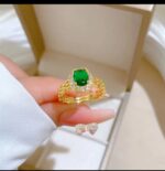 Gold Plated Ring with Green Stone Centerpiece and White Stones for Formal Events and Gifting