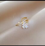 Gold Flower Ring with Cubic Zirconia Stones, Floral Design for Women, and Modern Jewelry for Everyday and Formal Occasions - Image 4