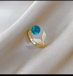 Gold Plated Ring with Blue Stone Leaf Design for Women - Modern Fashion Jewelry for Everyday - Image 4