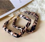 Animal Print Hoop Earrings with Gold Earring Backs for Women - Casual Fashion Statement with Zebra-Like Pattern
