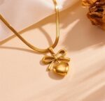 Gold Bow Heart Pendant Necklace
