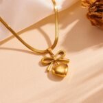 Gold Bow Heart Pendant Necklace