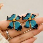 Elegant Blue Butterfly Flower Stud Earrings for Women, Dual-Tone Enamel Floral Design with Gold Tone Detailing, Trendy Fashion Jewellery for Party, Office, Festive and Daily Wear