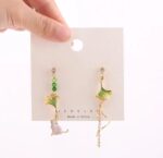Elegant Green Ginkgo Leaf Asymmetrical Drop Earrings for Women Gold Tone Pearl Beaded Nature Inspired Statement Jewellery for Party and Festive Wear - Image 3