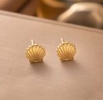 Elegant Gold Tone Seashell Stud Earrings for Women Textured Shell Design Statement Jewellery for Party Wedding Festive Beach Vacation and Everyday Wear - Image 5