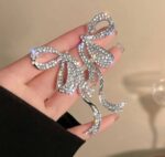 Elegant Silver Bow Crystal Drop Earrings for Women Sparkling Rhinestone Statement Jewellery for Party, Wedding, Festive and Stylish Special Occasion Wear - Image 3