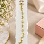 Elegant Gold-Tone Leaf Vine Bracelet for Women with Sparkling Clear Crystals, Delicate Botanical Design and Adjustable Chain, Stylish Fashion Jewellery for Party, Wedding and Festive Wear