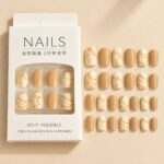 24 Pcs Nude Marble Press On Nails for Women, Beige and Cream Glossy Artificial Nail Set with Golden Marble Veins, Multiple Sizes for DIY Manicure, Party, Wedding and Everyday Wear