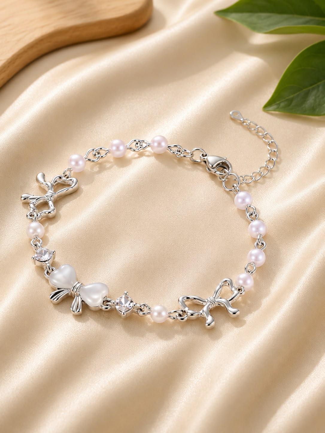 7 Elegant Silver-Tone Butterfly Pearl Bracelet for Women with White Heart Charms, Lustrous Pearl Beads, Sparkling Crystal Accents and Adjustable Chain, Delicate Fashion Jewellery for Party, Casual, Festive and Everyday Wear - Image 1